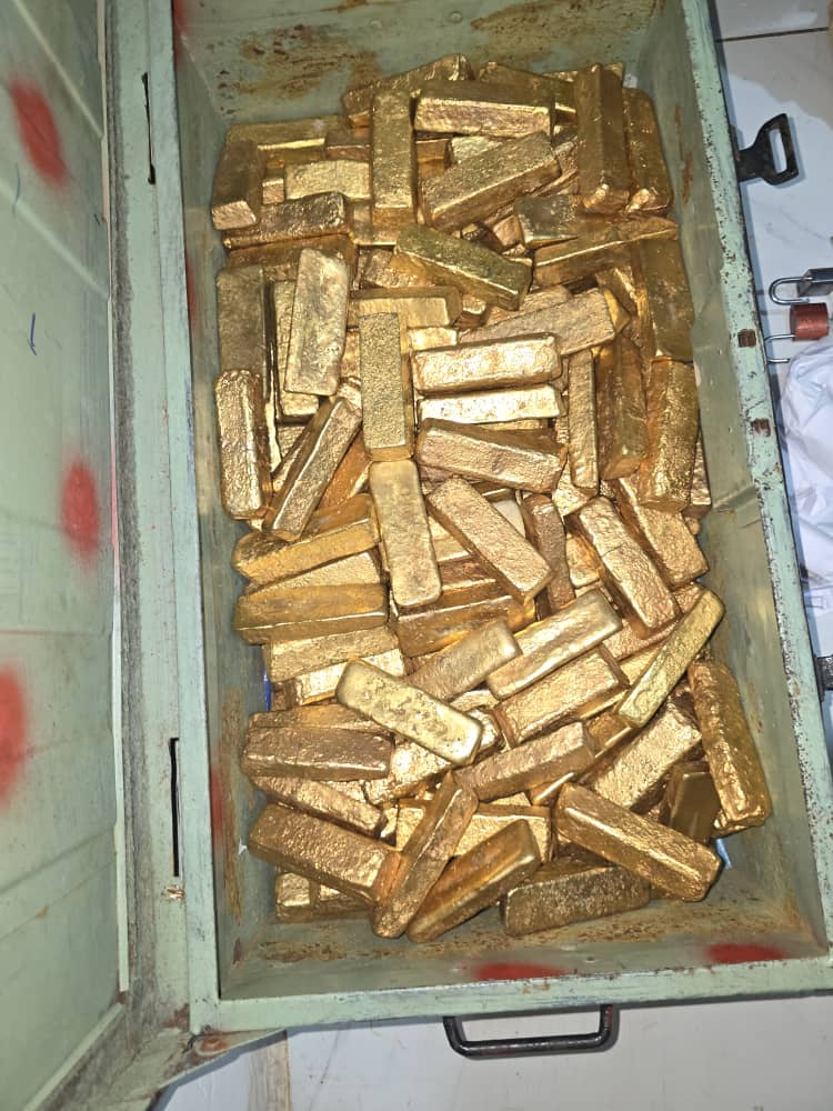 Gold bars stored in a secure metal case